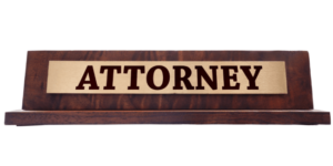 Attorney engraved name plate on a white background.