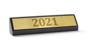Name plate with a 2021 engraving on a white background.