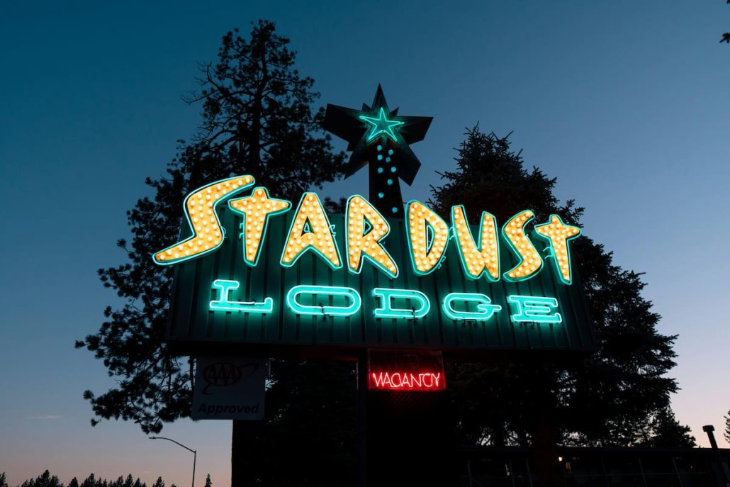 Neon Signage of Stardust Lodge