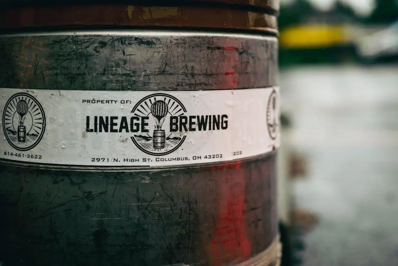Industrial polyester asset label on a metal surface used for equipment inventory tracking.